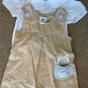 Tan Cat Pocket Dress with White Blouse